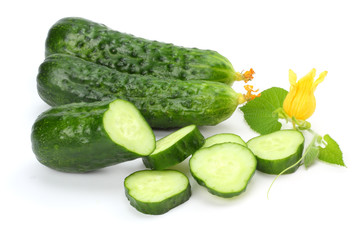 cucumber with sliced cucumber and leaf isolated on white background