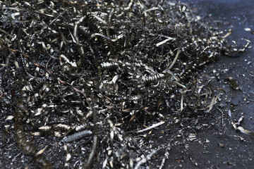 Metal swarf chips scrap cng milling iron close-up - obrazy, fototapety, plakaty