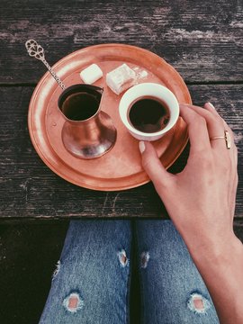 Woman drinking homemade black coffee