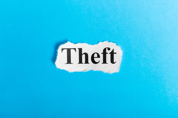 theft text on paper. Word theft on a piece of paper. Concept Image.