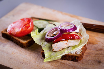 Cooking homemade grilled chicken sandwich