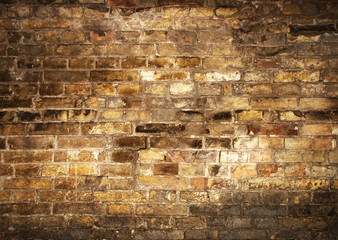 yellow grunge background of brick wall