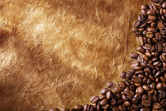 Coffee beans on grunge background © Alexstar