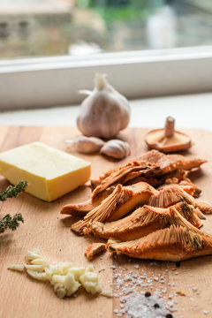 breakfast ingredients, pine mushrooms with butter and garlic
