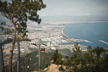 Fototapeta premium A view of elevator and Antalya, with mountains in the South of the city 8062.