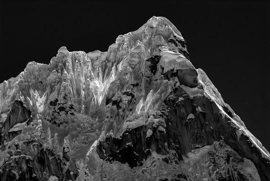 Complex ice and snow on mountain summit