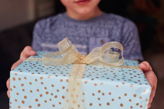 Child holding a present