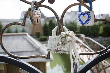 Wedding lock on a handrail. Symbol of marriage.
