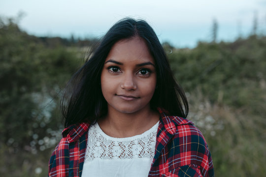 Portraits of young south asian girl enjoying being outside