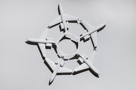 White airplane/jet formation on white background/miniature