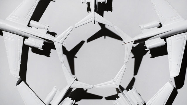 White airplane/jet formation on white background/miniature
