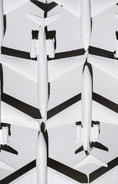 White airplane/jet formation on white background/miniature