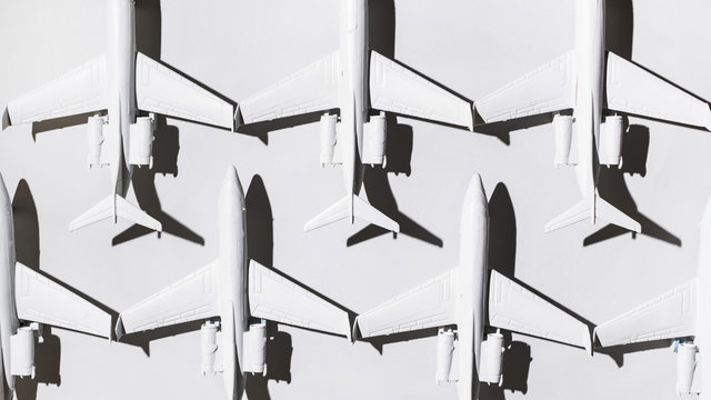 White airplane/jet formation on white background/miniature