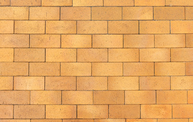 Fototapeta premium Background yellow brick walkway.