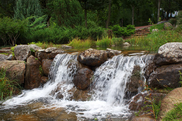 a small mountain river runs through the rocks