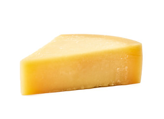 Piece of Parmesan cheese on white background