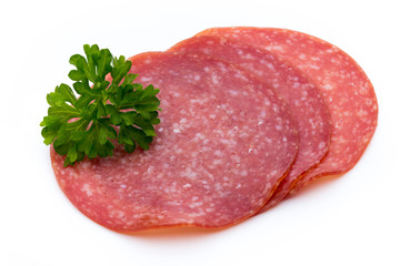 Salami slices isolated on white background.