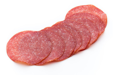 Salami slices isolated on white background.