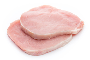 Fresh raw beef steak isolated on white background, top view.