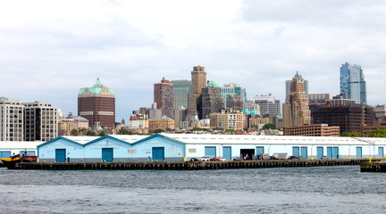 New York, USA - September 2016: Brooklyn Port Authority Marine Terminal along the East River with Brooklyn Heights in the background.