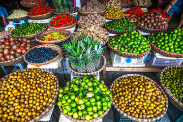 tropical spices and fruits sold at a local market in Hanoi (Vietnam)