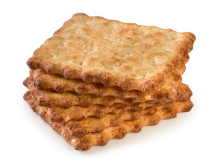 Stack of tasty, crunchy french crackers isolated on a white background, close up.