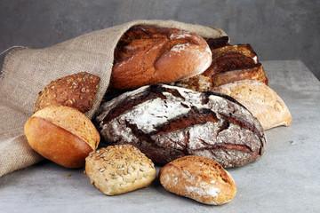 Freshly baked bread. Different kinds of bread and bread rolls on