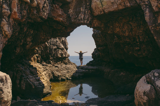 Reflection of a woman in a cave