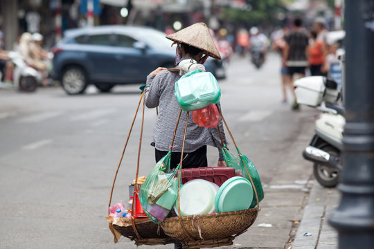 street vendors selling their goods in Hanoi, Vietnam