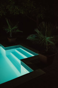 View of an outdoor pool at night