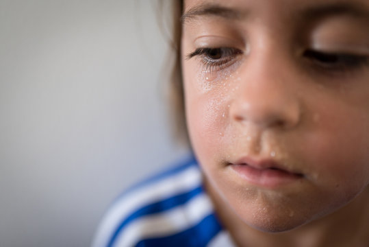 Up Close Photograph Of A Child's Sweaty Face