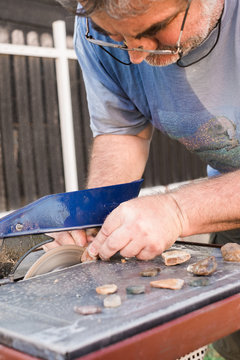 Senior Man Cutting Gemstones