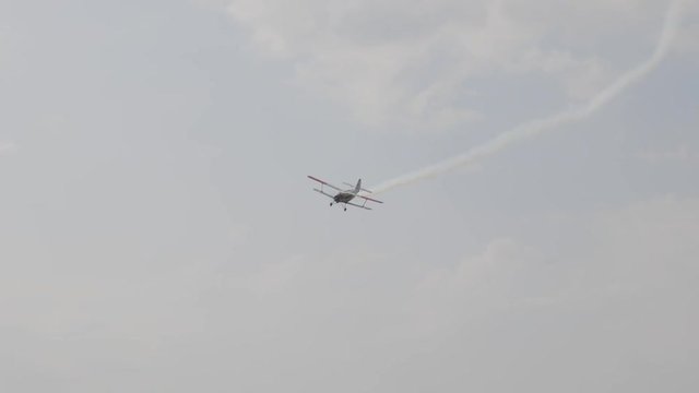 The An-2 aircraft flies in the sky
