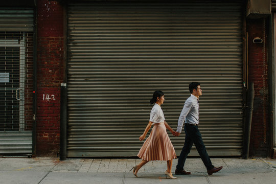 Couple Walking in Industrial Area