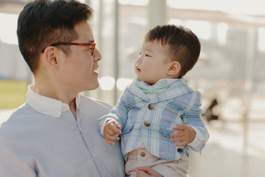 Father and Son Looking at Eachother