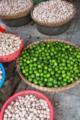 tropical spices and fruits sold at a local market in Hanoi (Vietnam)