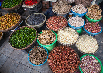 tropical spices and fruits sold at a local market in Hanoi (Vietnam)