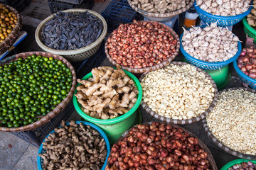 tropical spices and fruits sold at a local market in Hanoi (Vietnam)