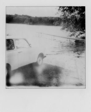 Black and White  of GDR Vintage Car Parked Near Lake