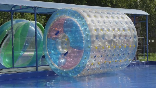Plastic zorbing ball on the lake water