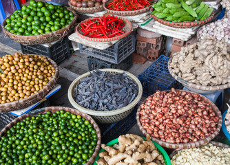 tropical spices and fruits sold at a local market in Hanoi (Vietnam)