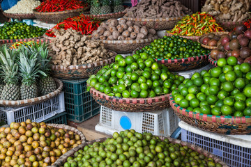 tropical spices and fruits sold at a local market in Hanoi (Vietnam)