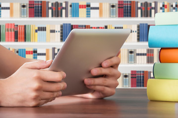 Person Hand Holding Digital Tablet