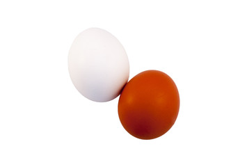 Two (2) chicken eggs of white and brown color, isolated on white background.