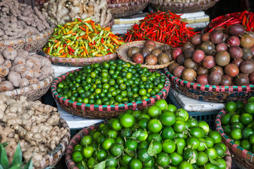 tropical spices and fruits sold at a local market in Hanoi (Vietnam)