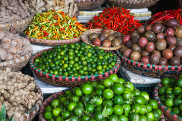 tropical spices and fruits sold at a local market in Hanoi (Vietnam)
