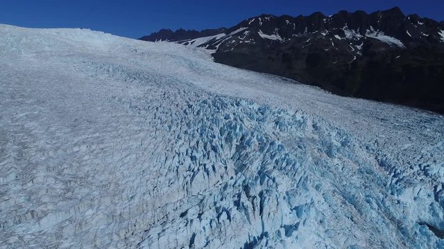 Arial 4k shots of a glacier and it's surroundings in Alaska