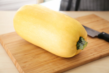 Fresh spaghetti squash on wooden board