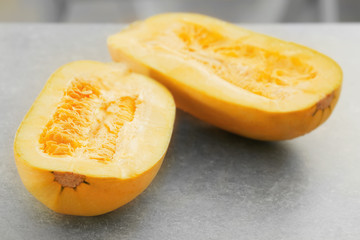 Halves of fresh spaghetti squash on table