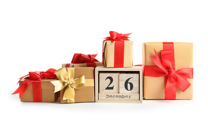 Composition with calendar and many gift boxes, isolated on white